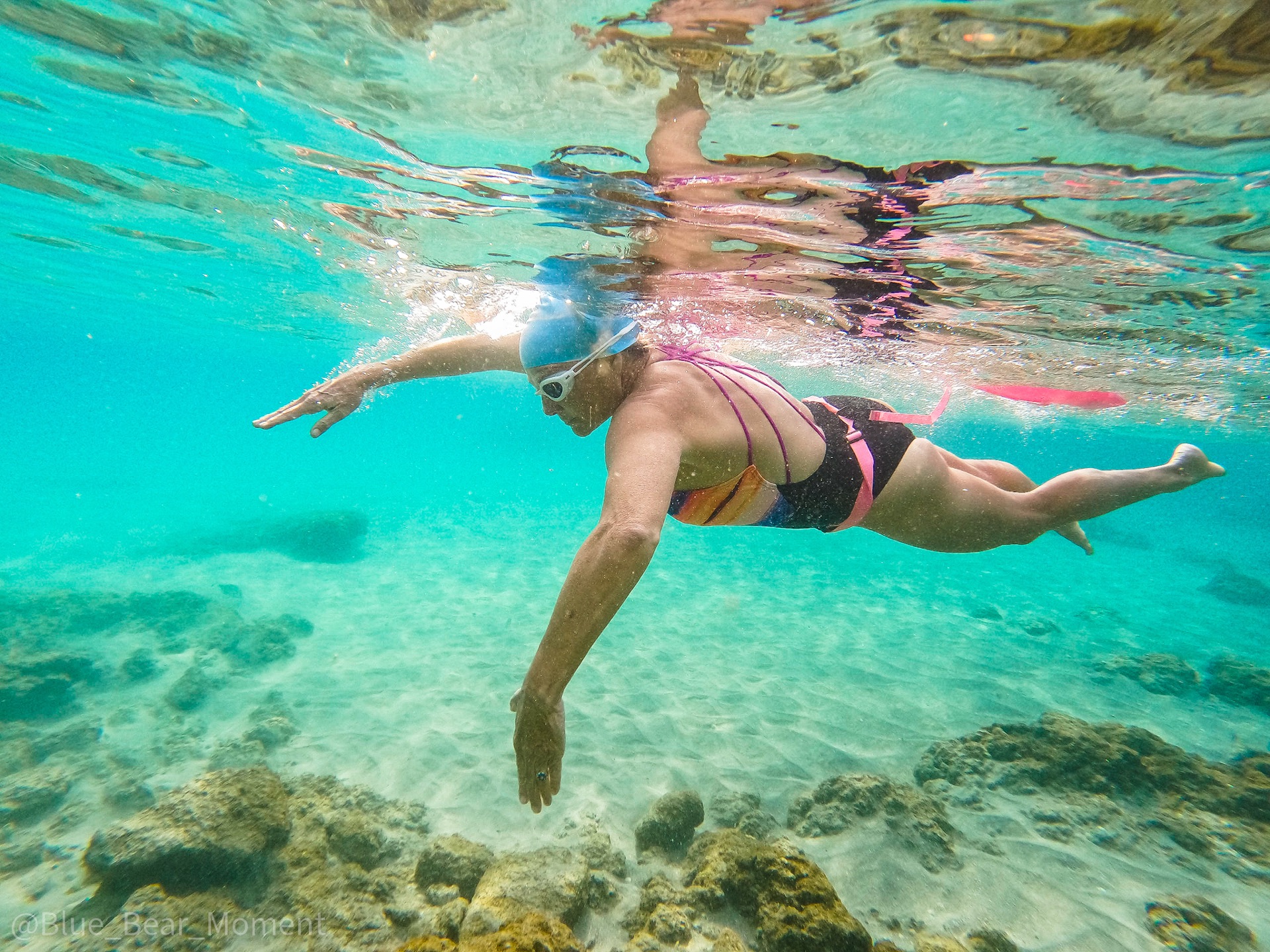 Audrey demonstrating front-quadrant freestyle underwater